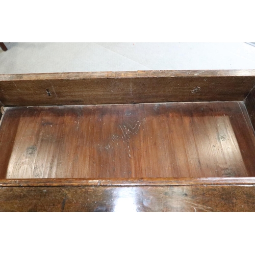 481 - A late 17th century oak chest of three drawers with fielded panel fronts and brass drop handles, 35