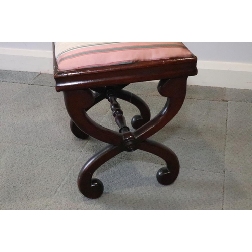 484 - A 19th century mahogany 'X' frame stool, 15