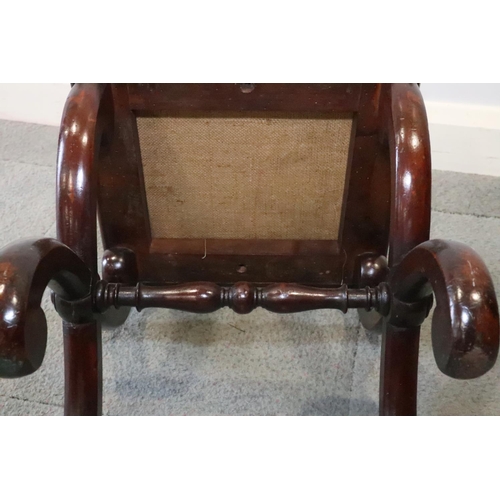 484 - A 19th century mahogany 'X' frame stool, 15