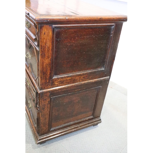 487 - An early 18th century oak chest of two short and three long drawers  (one shallow and two deep) with... 