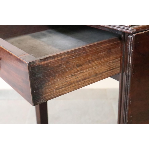 490 - An 18th century mahogany Pembroke table, on reeded square taper supports, 36