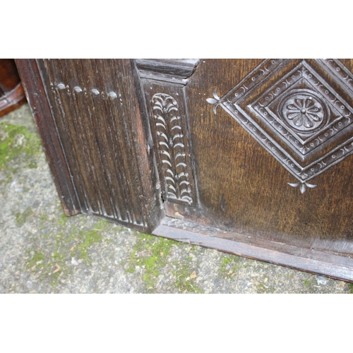 494 - A late 17th century carved oak 