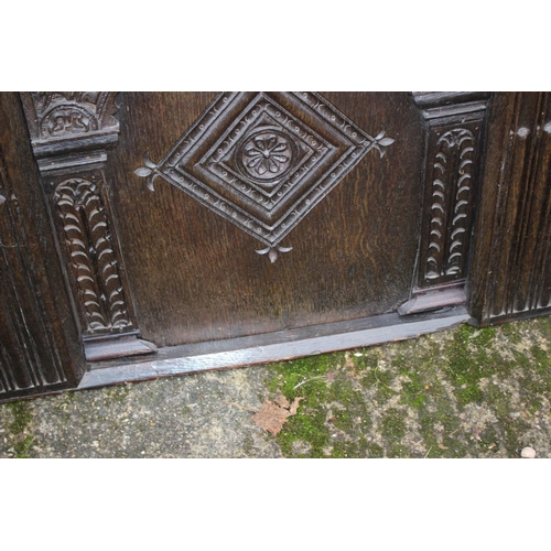 494 - A late 17th century carved oak 