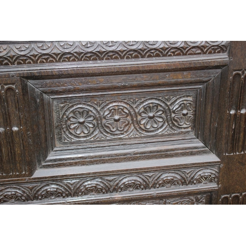 494 - A late 17th century carved oak 