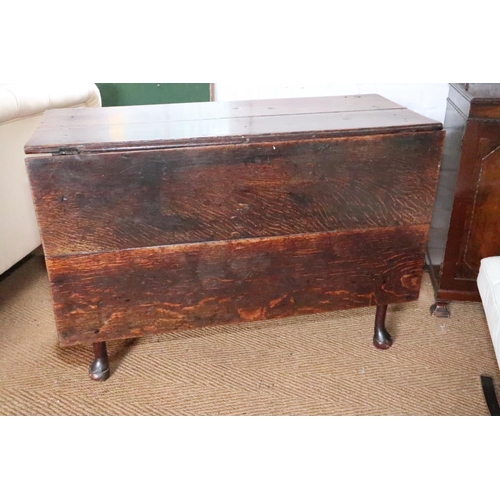 505 - An 18th century quarter cut oak plank top drop leaf table, on pole turn supports and pad feet, 42