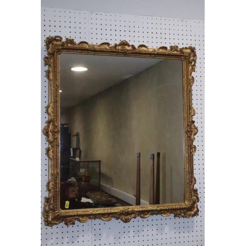 518 - A rectangular gilt framed wall mirror, 24