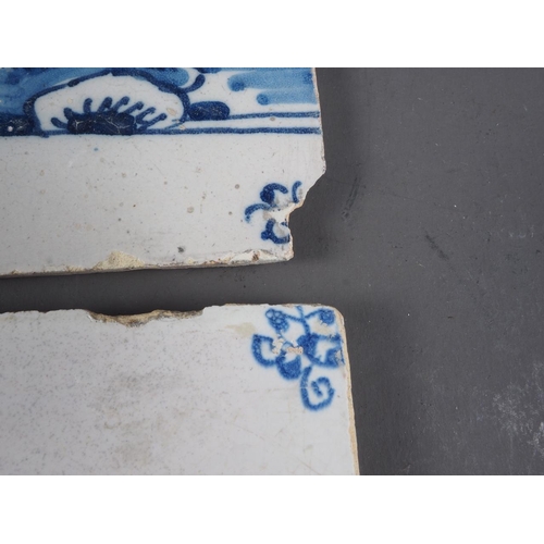 52 - An 18th century English delft blue and white tile with bridge and tower, and four similar tiles with... 