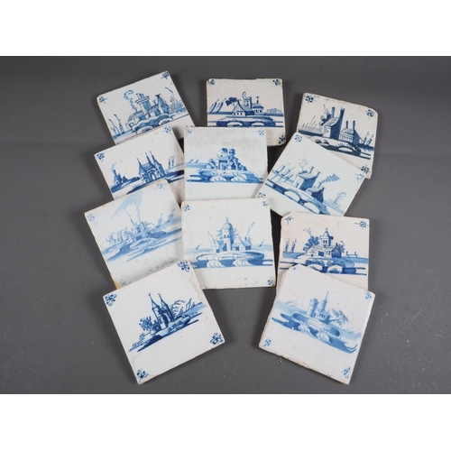 53 - Eleven early 18th century English delft blue and white tiles with building and boats