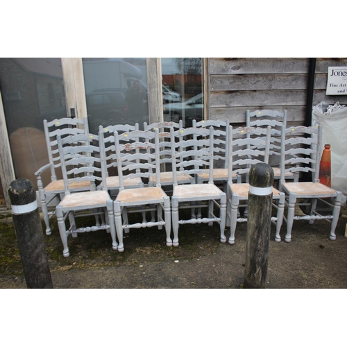 558 - A set of ten grey painted ladder back and rush seated dining chairs (8+2)