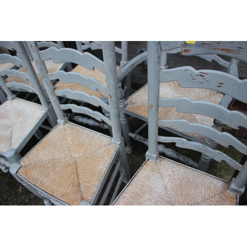 558 - A set of ten grey painted ladder back and rush seated dining chairs (8+2)