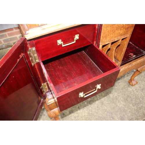 562 - A 1930s burr walnut fall front secretaire desk with fitted interior, including postal scales, barome... 