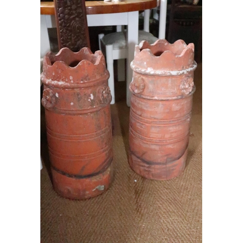 588 - Two terracotta chimney pots with 