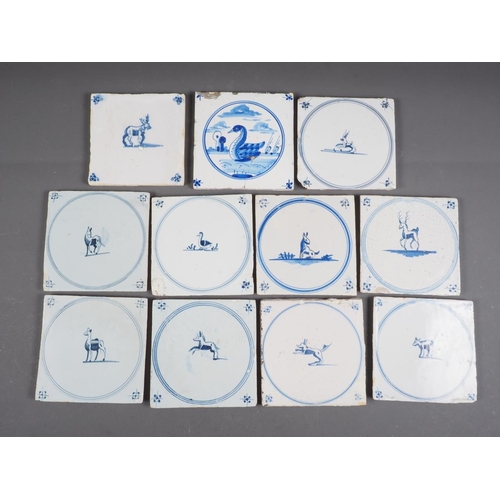 59 - Eleven early 18th century English delft blue and white tiles with animals and bird decoration