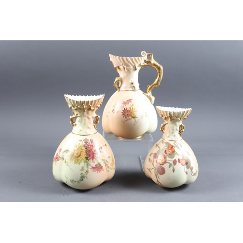 7 - A Royal Worcester blush ivory jug with gilt twig handle and floral decoration, 8 1/2