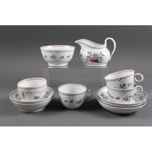 9 - An 18th century New Hall part teaset with central basket of flower decoration