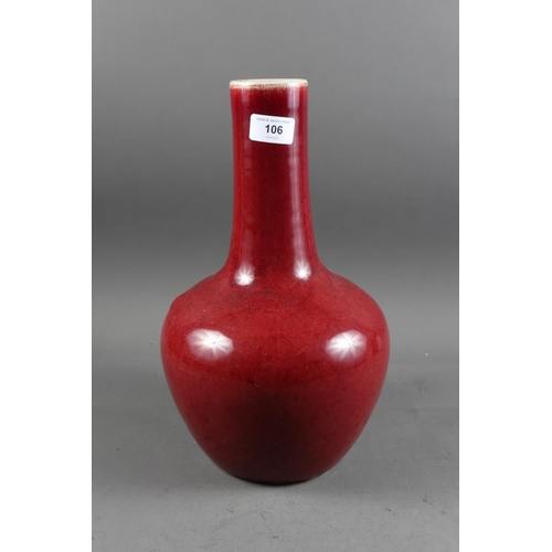 106 - A Chinese porcelain sang de boeuf bottle vase, 13 3/4