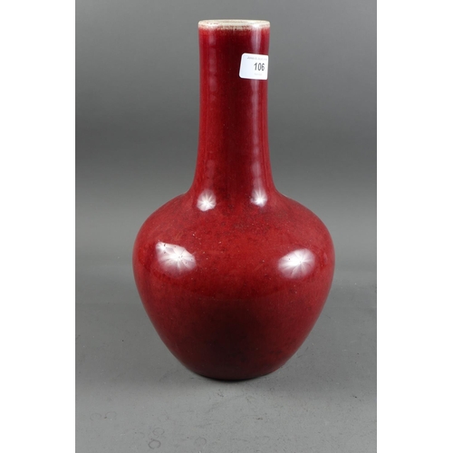 106 - A Chinese porcelain sang de boeuf bottle vase, 13 3/4