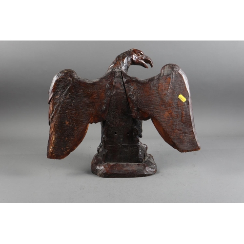 189 - A late 17th century carved oak eagle with spread wings, 15