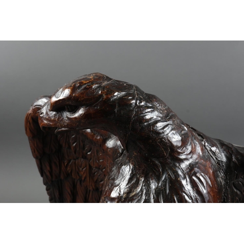 189 - A late 17th century carved oak eagle with spread wings, 15