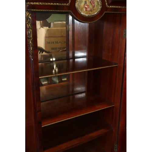 534 - A Louis XVI design mahogany and brass mounted display cabinet enclosed glazed door with ceramic pane... 