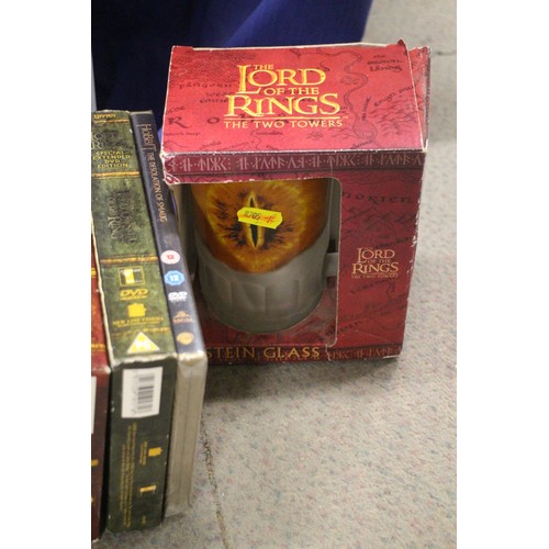 225 - A quantity of Lord of the Rings and The Hobbit DVD sets and J R R Tolkien books, various