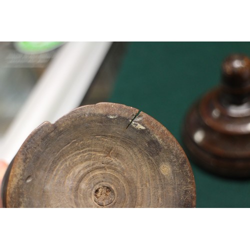 192 - An 18th century cherrywood cup and cover, on circular foot, 8 1/2