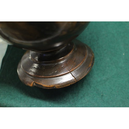 192 - An 18th century cherrywood cup and cover, on circular foot, 8 1/2