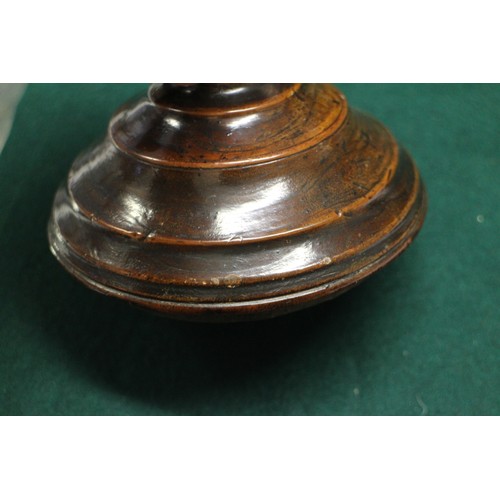 192 - An 18th century cherrywood cup and cover, on circular foot, 8 1/2