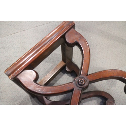 484 - A 19th century mahogany 'X' frame stool, 15