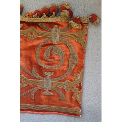 253 - An early 20th century half tester hanging of 17th century design in red plush with metal thread embr... 