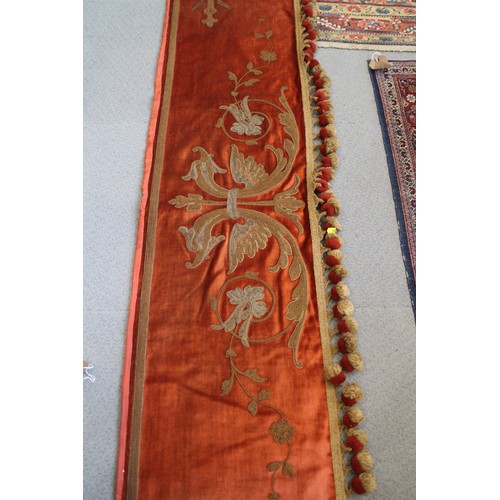 253 - An early 20th century half tester hanging of 17th century design in red plush with metal thread embr... 