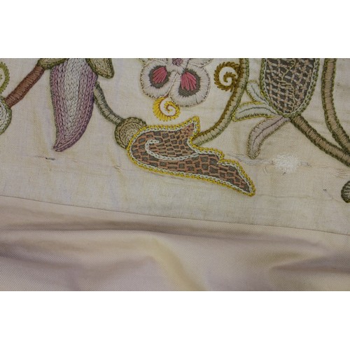 249 - A linen and 17th century wool crewel work bedspread, 81