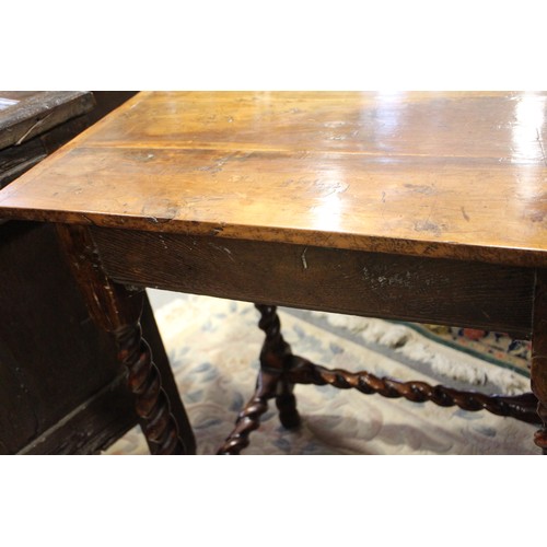 430 - An early 18th century yew side table, fitted one drawer with brass shaped drop handle, on bobbin tur... 