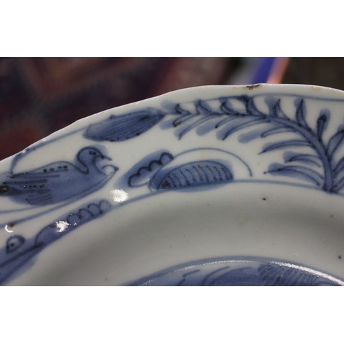 102 - A Chinese blue and white export octagonal plate with peony and bird decoration, 8 3/4