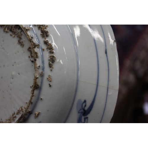 102 - A Chinese blue and white export octagonal plate with peony and bird decoration, 8 3/4