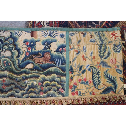 252 - A circa 1700 crewel work fragmentary landscape panel with additional end panels and later fringe, 19... 