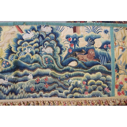 252 - A circa 1700 crewel work fragmentary landscape panel with additional end panels and later fringe, 19... 