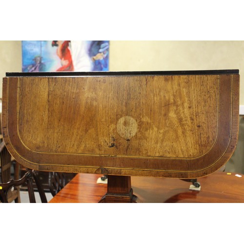 446 - A Regency rosewood and mahogany banded sofa table, fitted two drawers with brass star handles, on sp... 