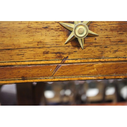 446 - A Regency rosewood and mahogany banded sofa table, fitted two drawers with brass star handles, on sp... 