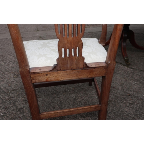 487 - A set of eight Hepplewhite Revival mahogany dining chairs with pierced and carved splats and stuffed... 