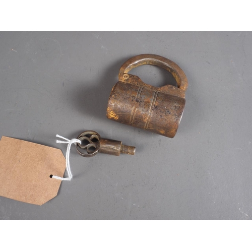 100 - An early 18th century padlock and key, 3 1/2