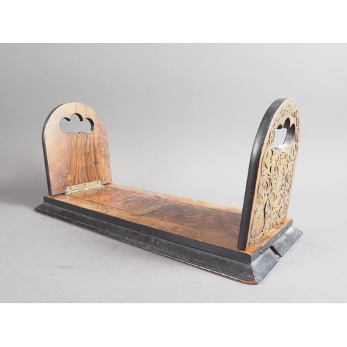 133 - A Victorian burr walnut and pierced and scroll brass mounted pair of sliding bookends, 15 3/4