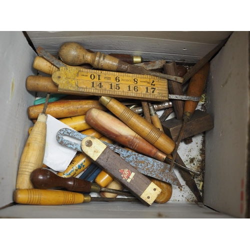 141 - A collection of wood carving chisels and other hand tools, etc