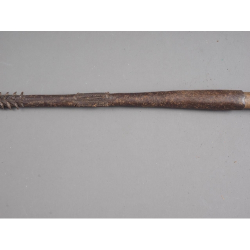 166 - A hardwood and metal spear with barbed head, 43