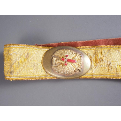 172 - An early 20th century gilt embroidered Spanish Parade belt with brass and red enamelled badge, 40 1/... 