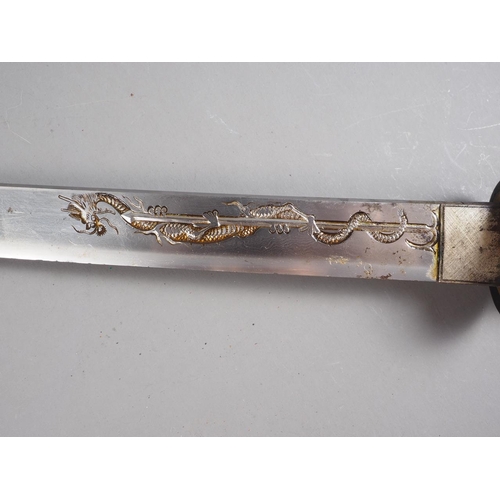 182 - A 19th century Japanese Tanto short sword, blade with engraved dragon on one side and a cherry bloss... 