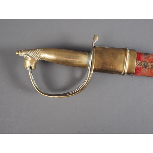 184 - A rapier with engraved blade, pierced brass guard and classical themed handle, 39 1/2” long, and an ... 