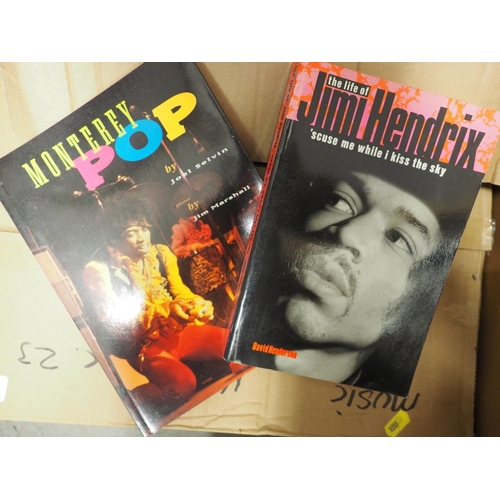 229 - A quantity of mostly rock themed books and magazines, including Mojo, 