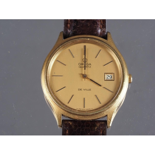 297 - A gentleman’s Omega De Ville quartz wristwatch with gilt dial, baton numerals, and date apertu... 