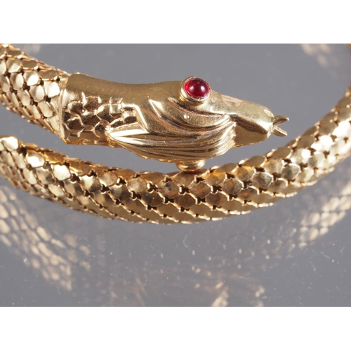 301 - An Italian 18ct gold serpent bracelet with ruby eyes, 43.2g